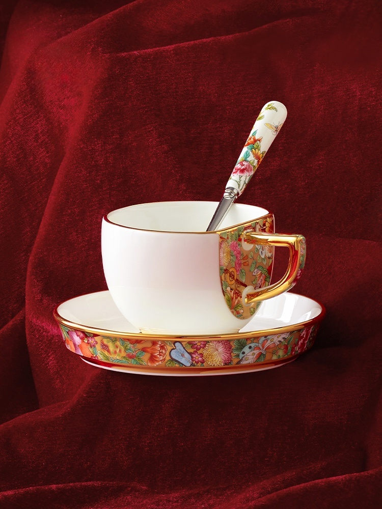Guangcai Legacy 3-Piece Coffee Set, cup, saucer and spoon set on red velvet background